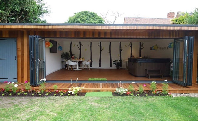 aluminium bifolding doors in garden room