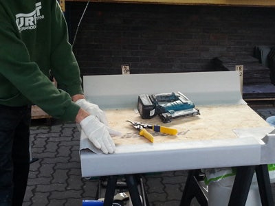 CureIt GRP Flat Roofing System - positioning edge pieces