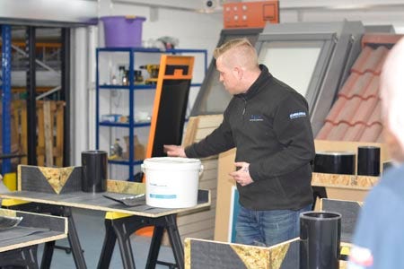 Classicbond demonstration with contact adhesive bucket visible