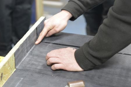 Press the surfaces together to avoid bubbles and tenting