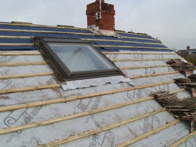 Klober roofing felt installed under the batten and around the position of a new roof window for a loft conversion