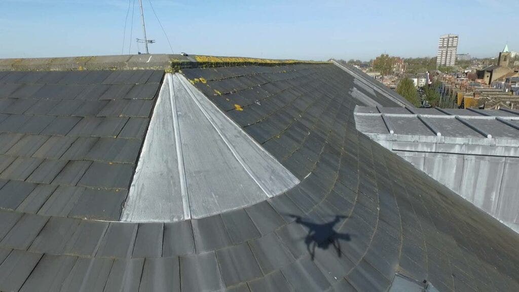 Drone inspecting a roof