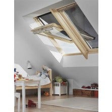 Two Velux windows mounted side by side in a lovely white room