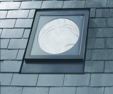 A Sun Tunnel installed in a slate roof