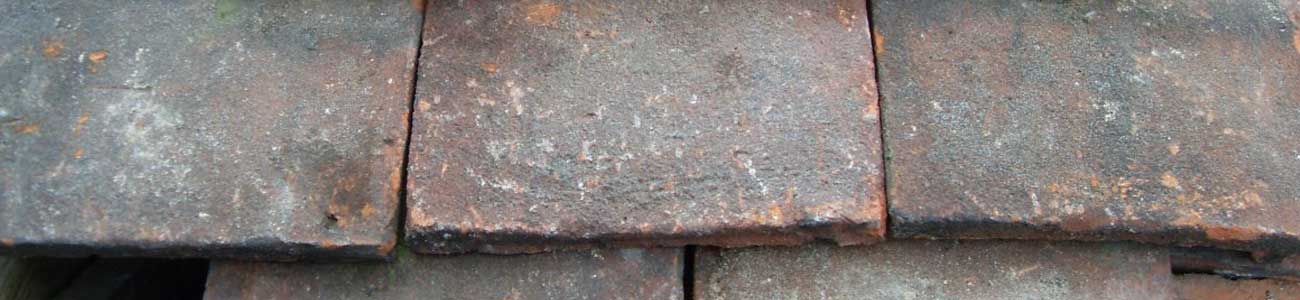 close-up of reclaimed roof tiles on a building