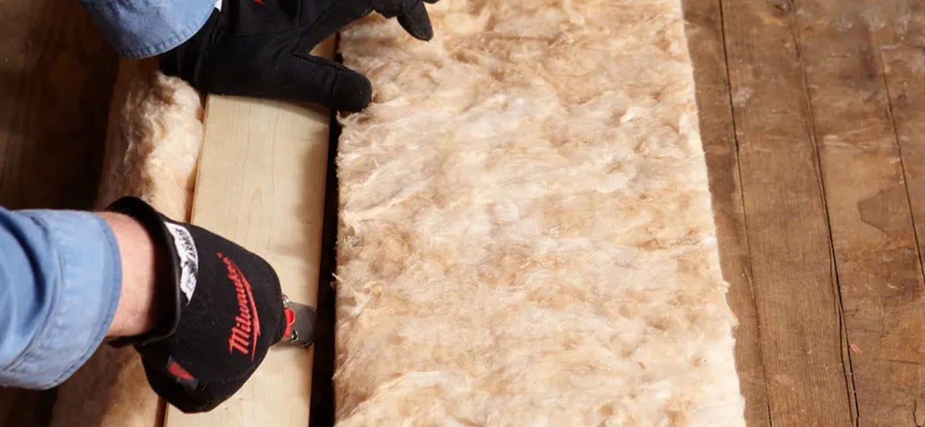 Loft insulation being cut to size