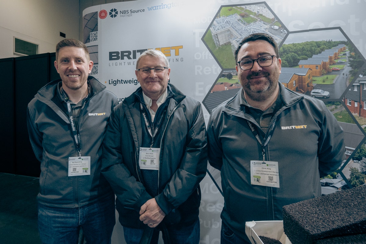 Steve Wells from JJ Roofing Supplies with Neil Spratling and Chris King at the Britmet Leightweight Roofing stand at Futurebuild 2024 at the ExCel London