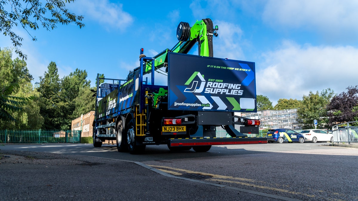 JJ Roofing Supplies Mercedes Crane Dropside 2023 at an angle