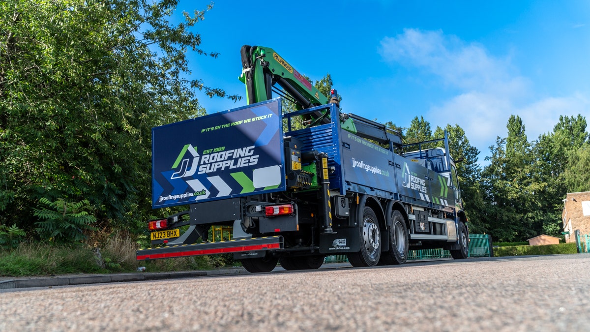 JJ Roofing Supplies Mercedes Crane Dropside 2023 rear angle