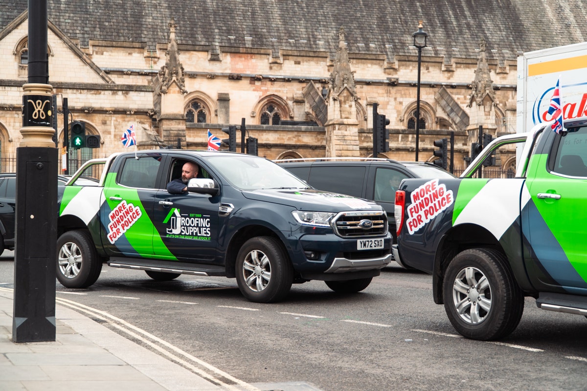 The JJ Roofing Supplies Rangers infront of the Houses of Parliament - Big Ben