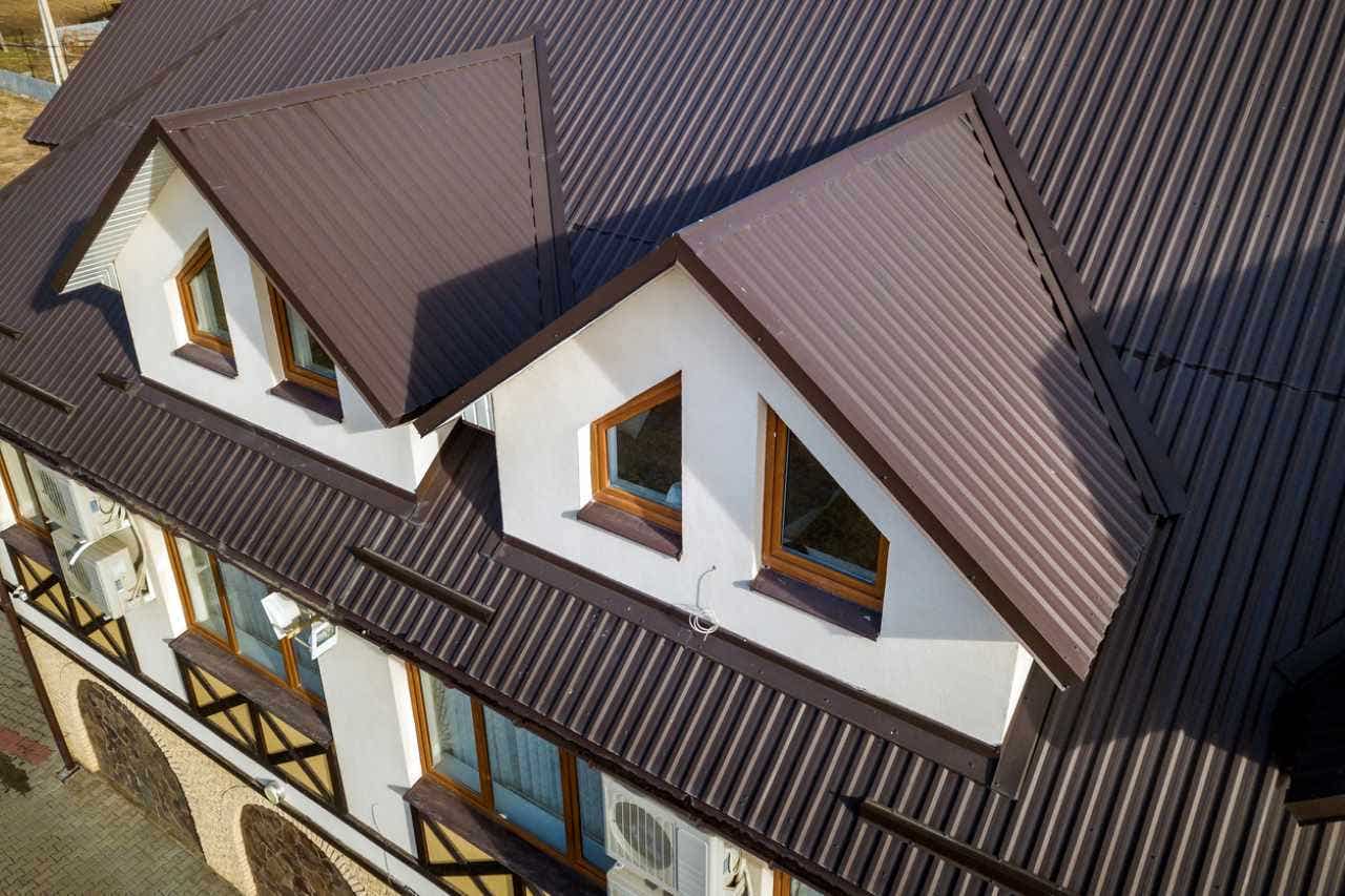 top view of a house with a brown colored metal roofing installed