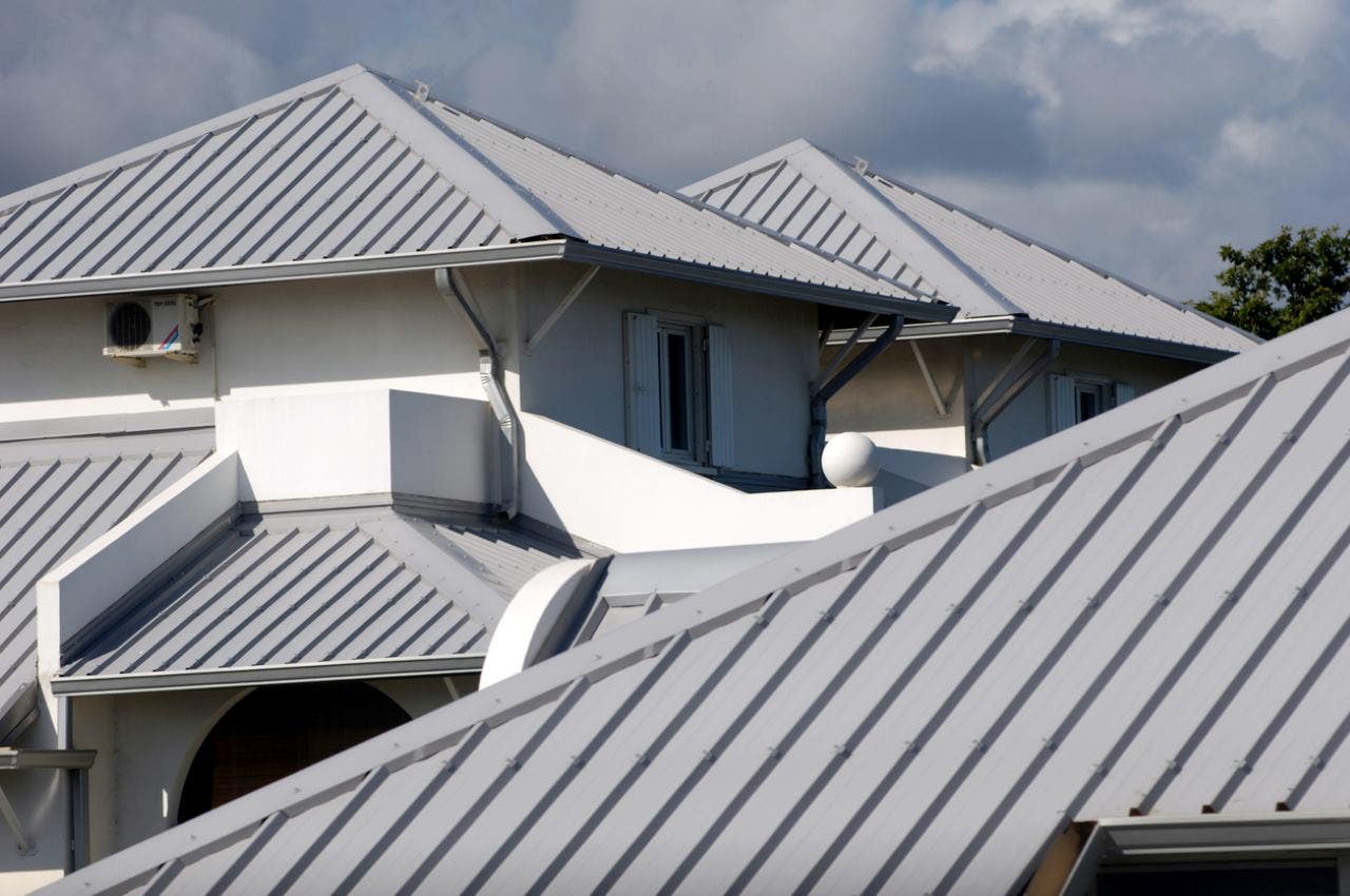 house with gray colored metal roofing