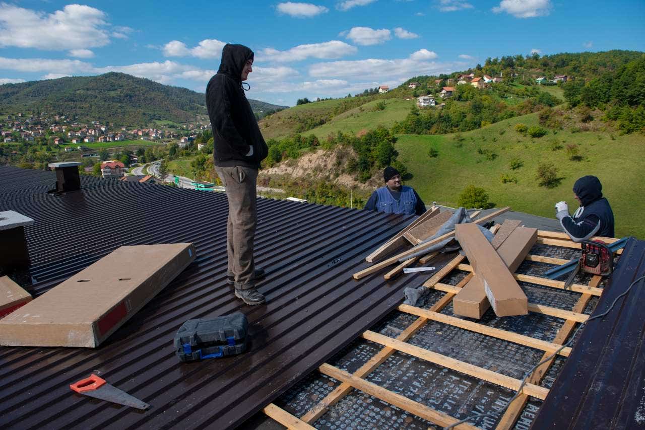 Construction worker working on a new roof