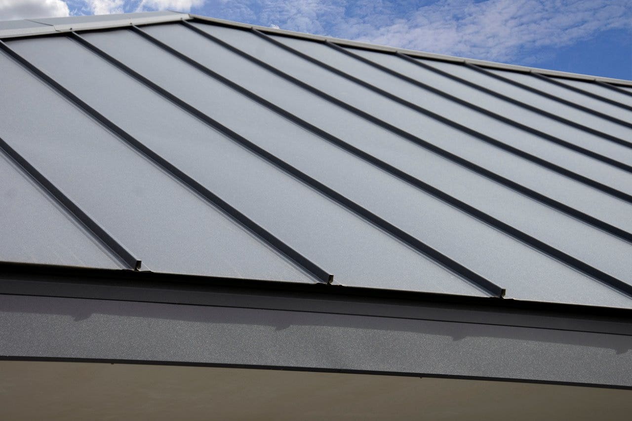 gray seam metal roofing on a house